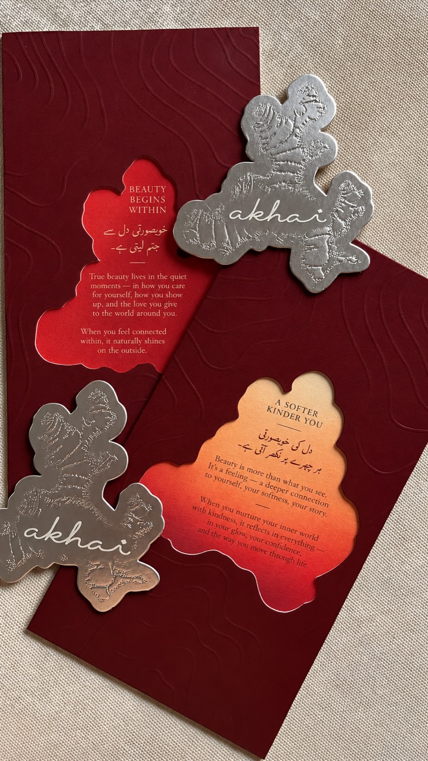 Akhai branding cards in maroon